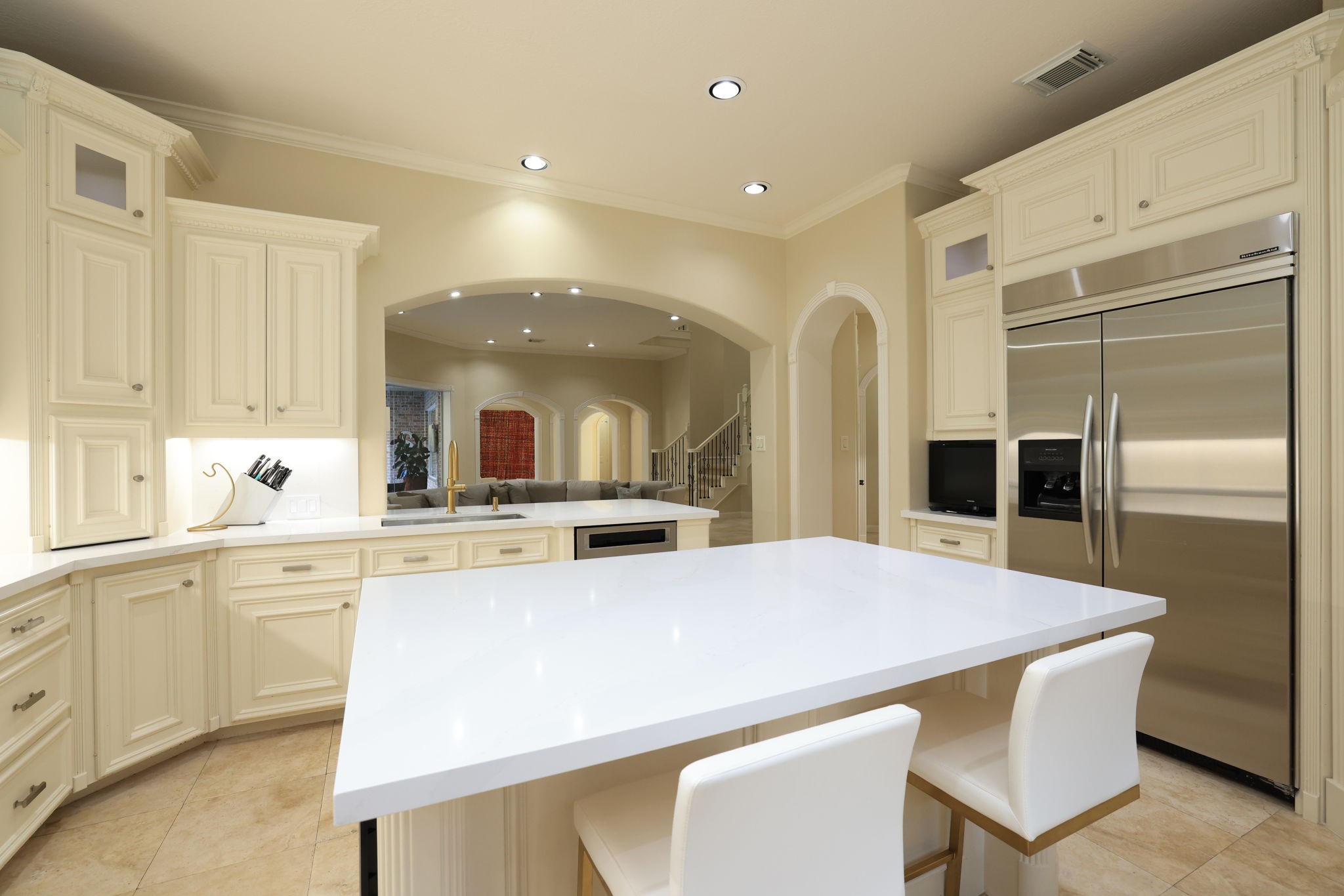 16610 Fern Rock Falls Court Spring, TX 77379 - Photo 16 of 49 a kitchen with stainless steel appliances a sink and a refrigerator