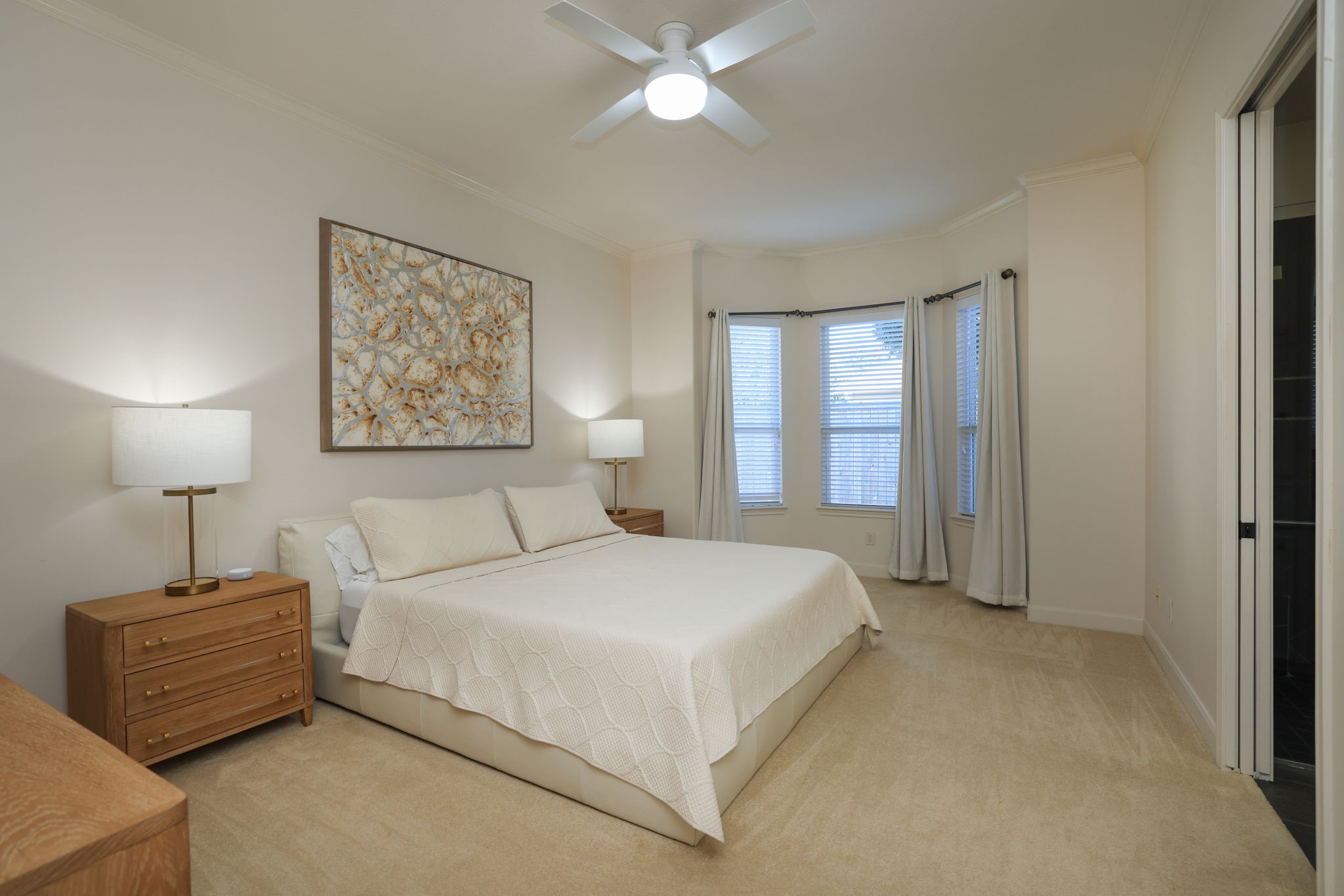 16610 Fern Rock Falls Court Spring, TX 77379 - Photo 19 of 49 a bedroom with a bed and a window