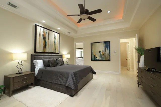 a bedroom with a bed and furniture