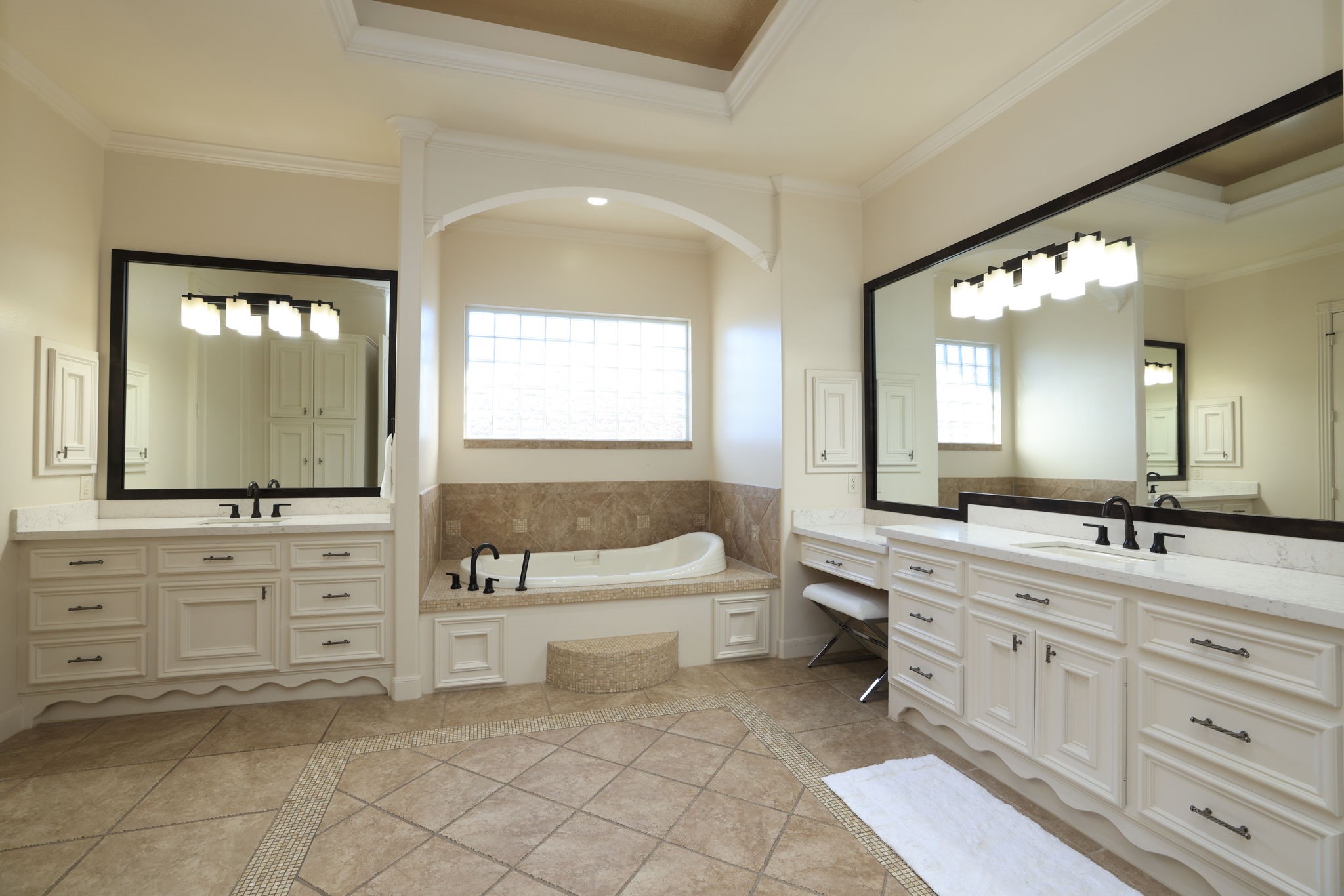 16610 Fern Rock Falls Court Spring, TX 77379 - Photo 23 of 49 a spacious bathroom with a granite countertop sink mirror and a