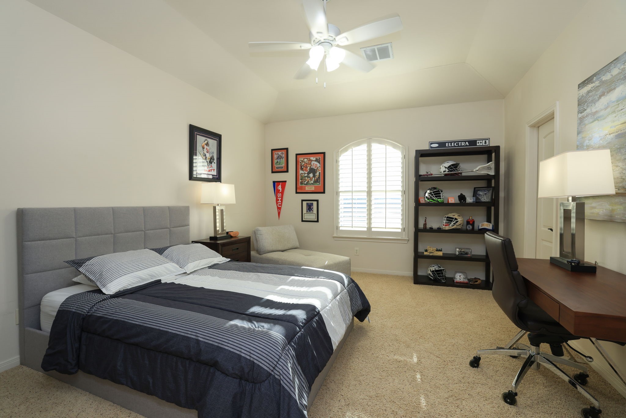 16610 Fern Rock Falls Court Spring, TX 77379 - Photo 40 of 49 a bedroom with a bed a furniture and a chandelier