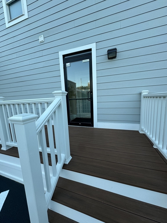 4 Bay Street, Unit A0 Hull, MA 02045 - Photo 16 of 23 a view of wooden staircase