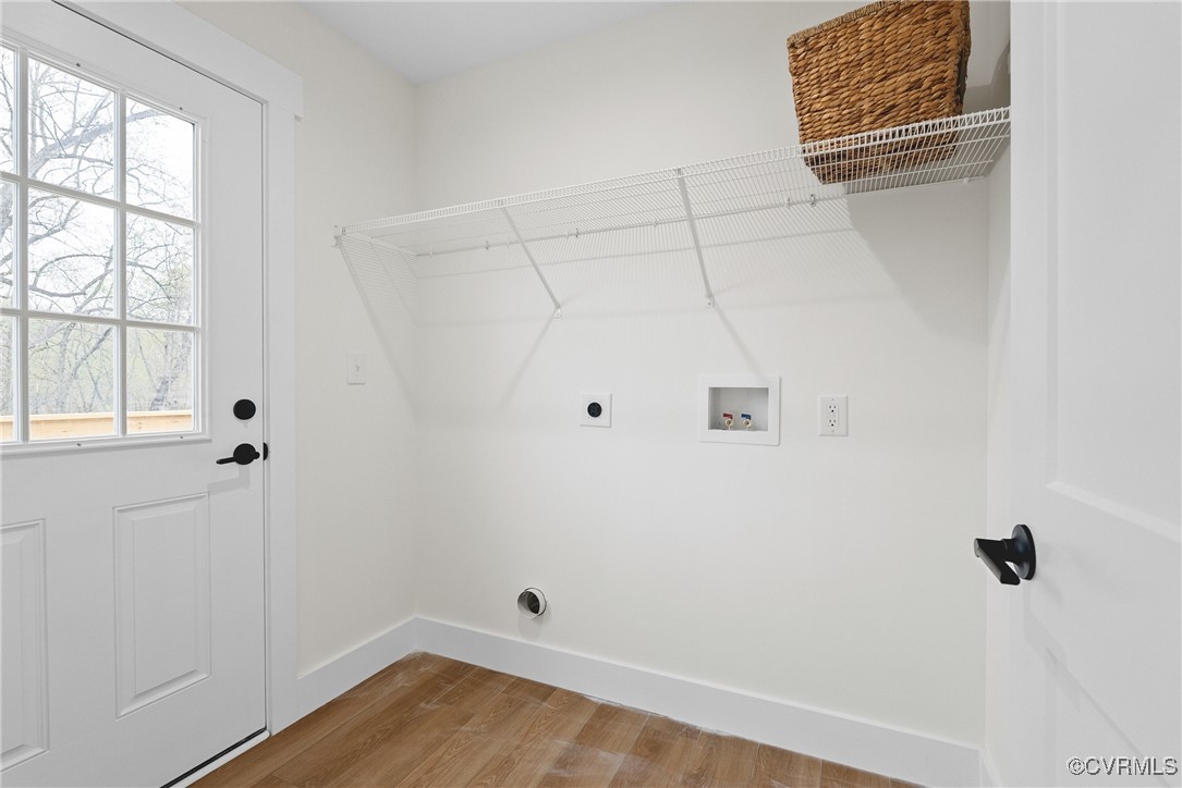 26428 Dejarnette Lane Ruther Glen, VA 22546 - Photo 12 of 27 a view of a room with wooden floor and windows
