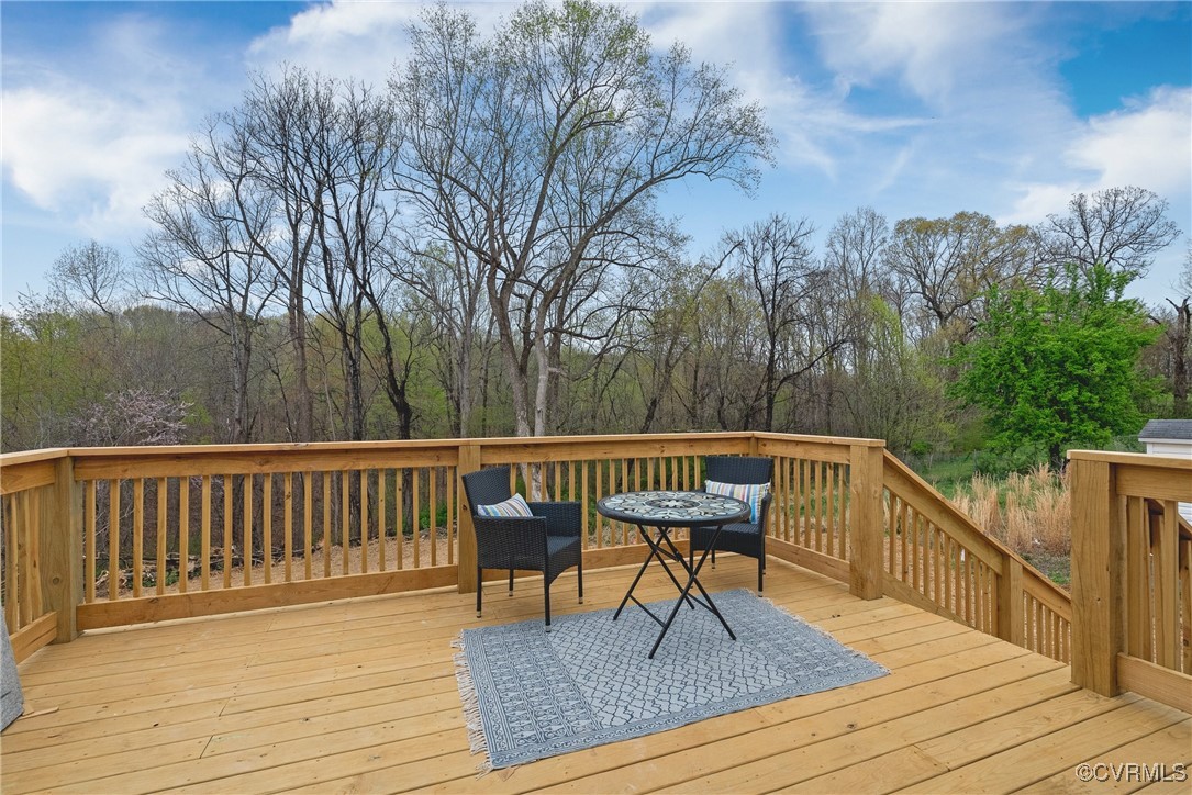 26428 Dejarnette Lane Ruther Glen, VA 22546 - Photo 13 of 27 a view of backyard with deck and trees