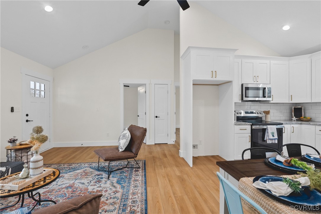 26428 Dejarnette Lane Ruther Glen, VA 22546 - Photo 19 of 27 a bedroom with a bed and furniture