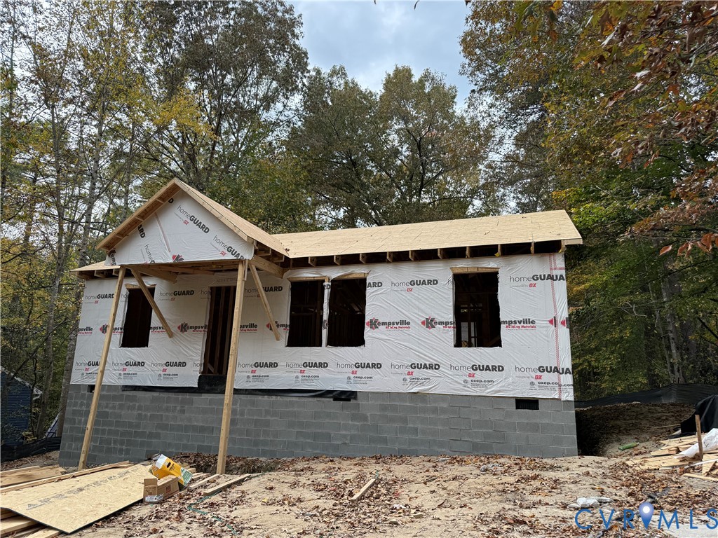 26428 Dejarnette Lane Ruther Glen, VA 22546 - Photo 26 of 27 a view of a house with a yard