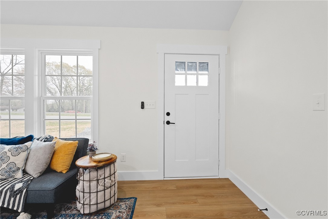 26428 Dejarnette Lane Ruther Glen, VA 22546 - Photo 3 of 27 a bedroom with furniture and a window