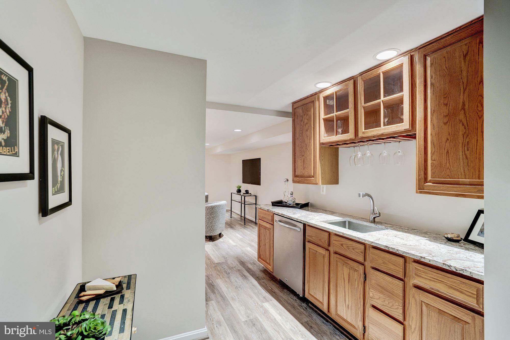 11403 Hollow Timber Way Reston, VA 20194 - Photo 27 of 45 Lower Level Family Room w/ Wet Bar& Mini Fridge