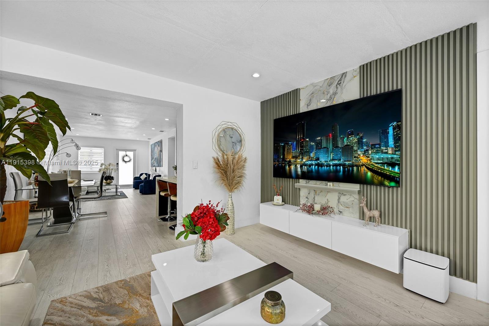 444 Southwest 64th Avenue Miami, FL 33144 - Photo 15 of 70 a living room with furniture and a flat screen tv