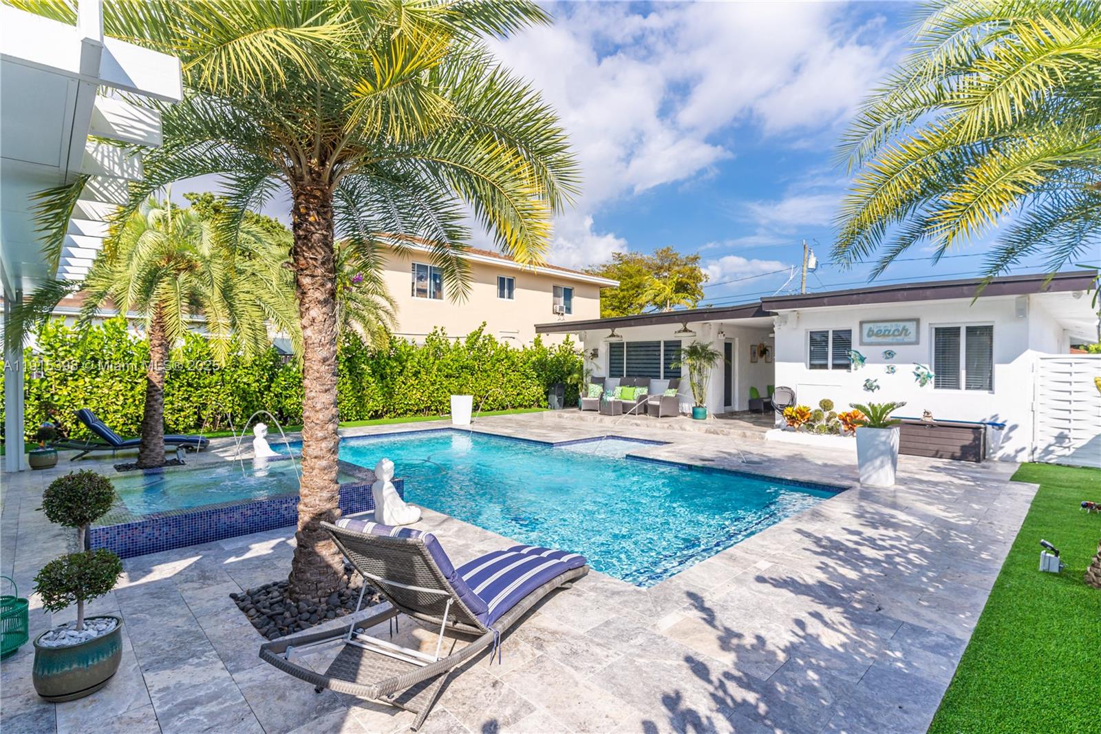 444 Southwest 64th Avenue Miami, FL 33144 - Photo 41 of 70 a view of a house with backyard sitting area and swimming pool