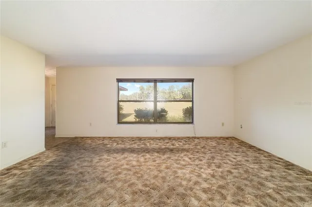 a bathroom with a sink double vanity mirror and a toilet