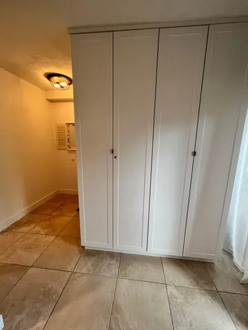 a bathroom with a sink a mirror and a toilet