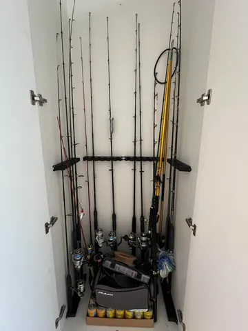 a bathroom with a shower and mirror