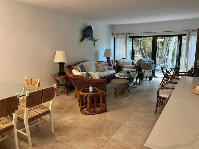 a bed room with a bed and a night stand