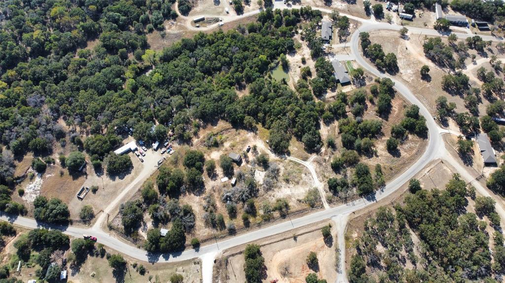 Tbd Tbd Wild Hill Springtown, TX 76082 - Photo 7 of 15 an aerial view of a residential houses with yard
