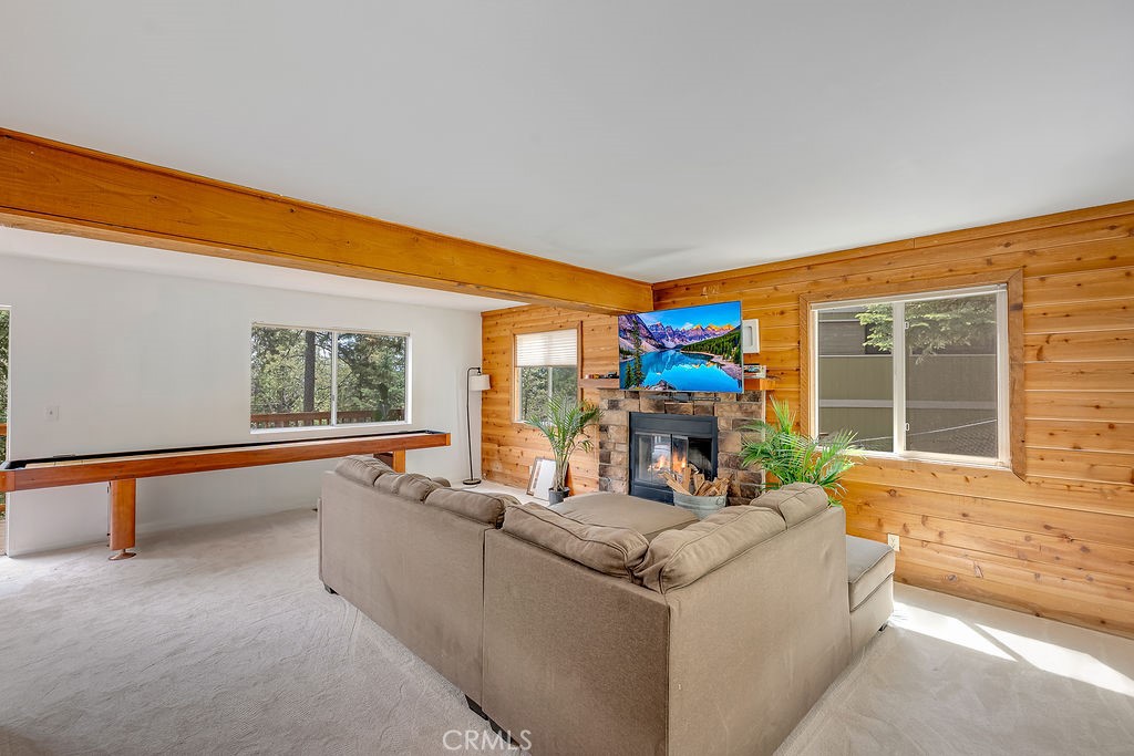 318 Old Toll Road Lake Arrowhead, CA 92352 - Photo 6 of 44 a living room with furniture and a large window
