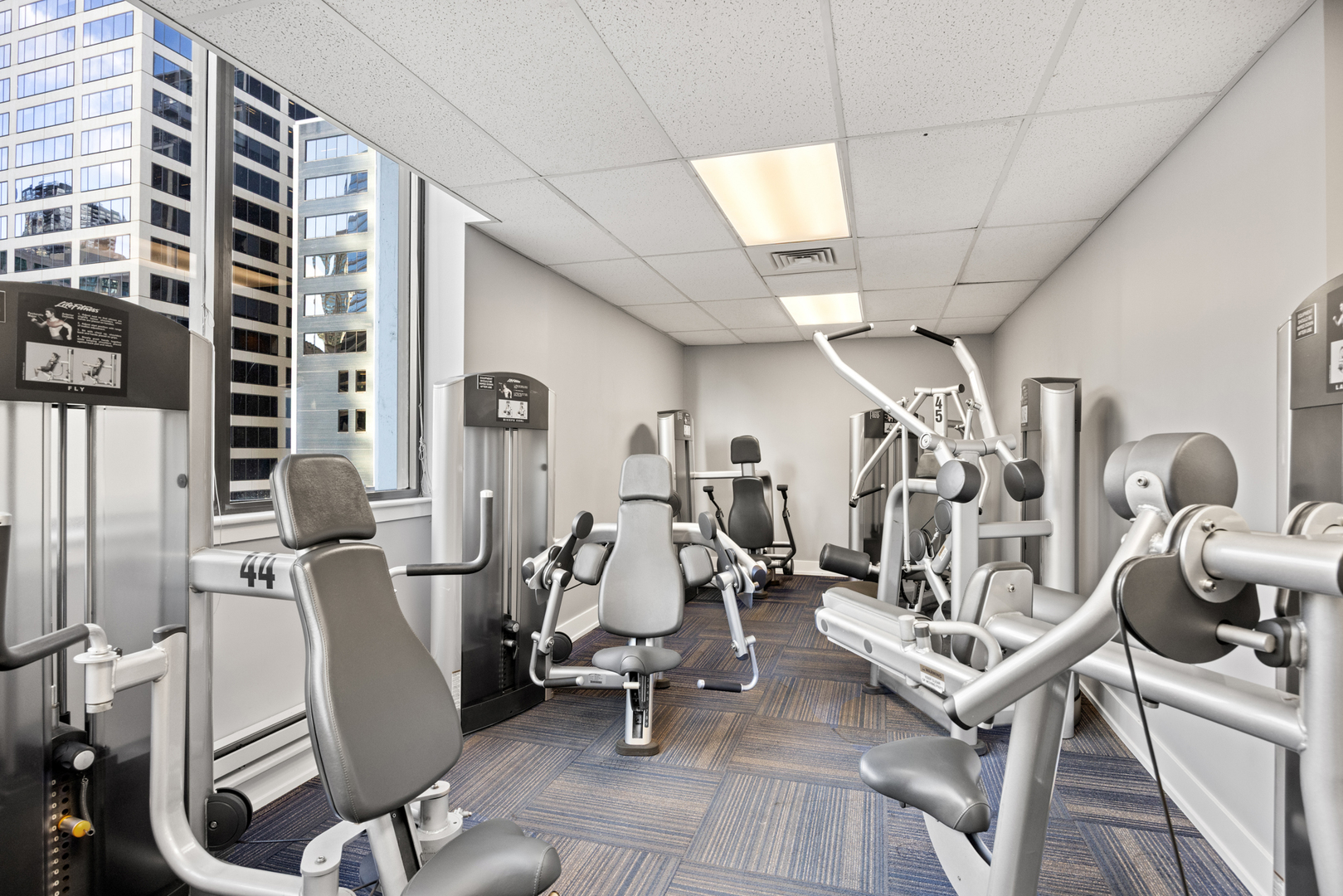 405 North Wabash Avenue, Unit 2801 Chicago, IL 60611 - Photo 16 of 29 a view of a room with gym equipment