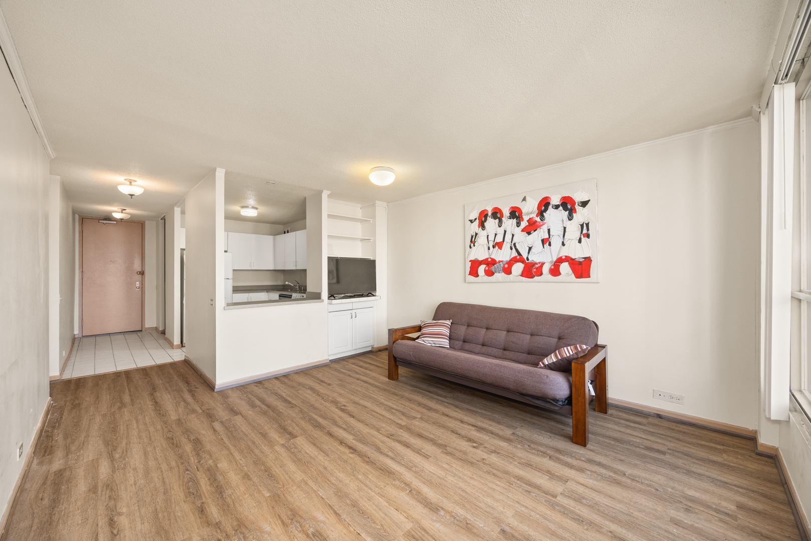 405 North Wabash Avenue, Unit 2801 Chicago, IL 60611 - Photo 20 of 29 a living room with furniture and a wooden floor