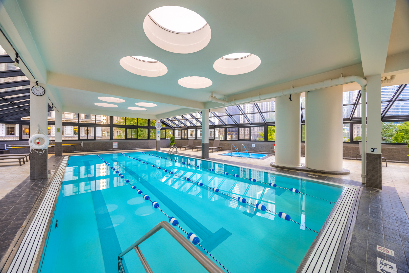 405 North Wabash Avenue, Unit 2801 Chicago, IL 60611 - Photo 6 of 29 a kitchen with lots of counter top space and stainless steel appliances