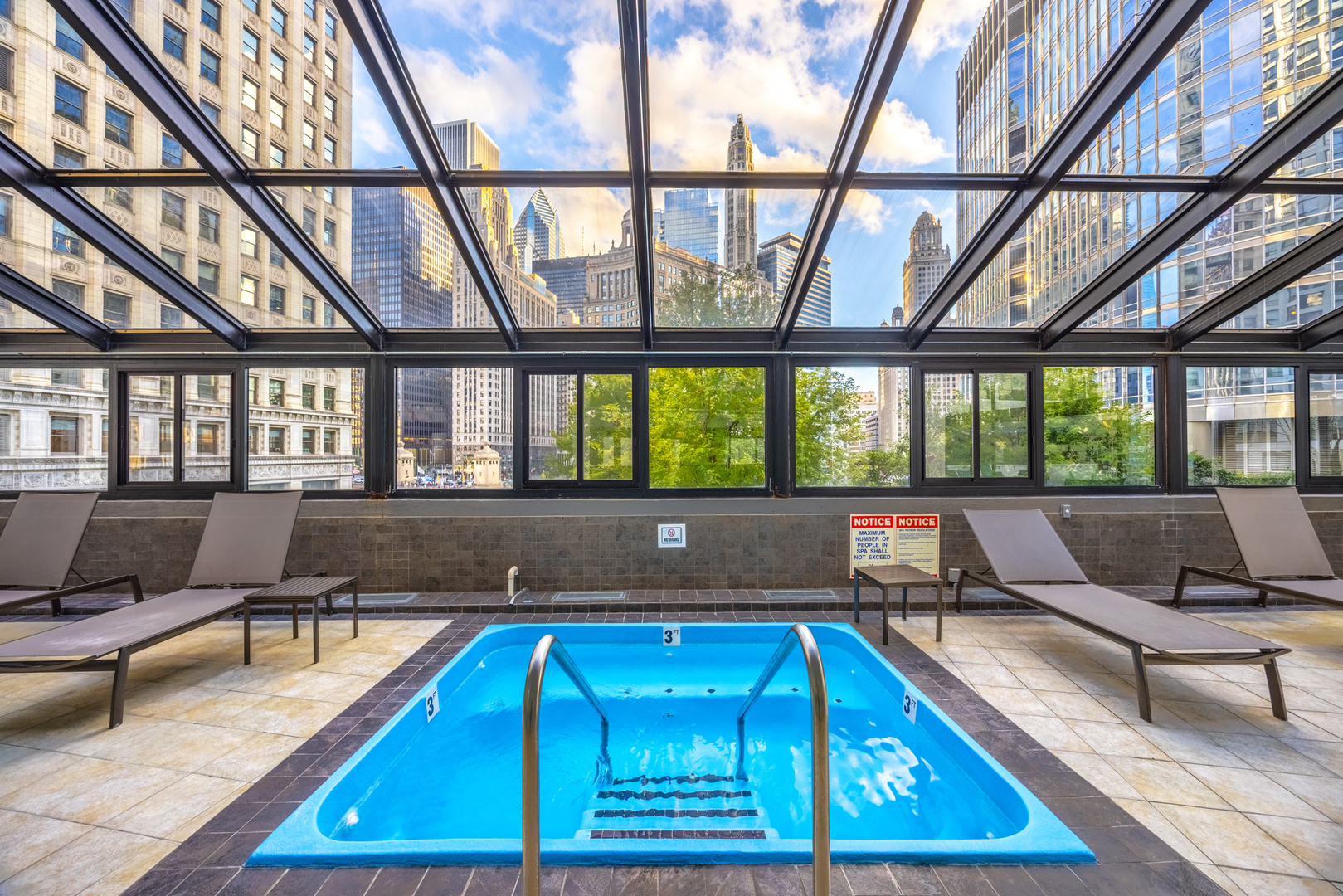 405 North Wabash Avenue, Unit 2801 Chicago, IL 60611 - Photo 7 of 29 a living room with a couch and a table