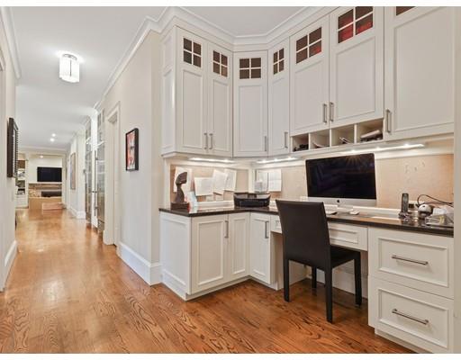 14 Lehigh Road Wellesley, MA 02482 - Photo 14 of 27 a kitchen with granite countertop a stove and white cabinets
