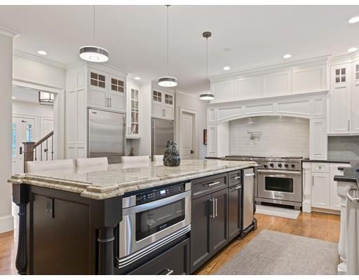 14 Lehigh Road Wellesley, MA 02482 - Photo 8 of 27 a kitchen with stainless steel appliances granite countertop a stove a sink and a refrigerator