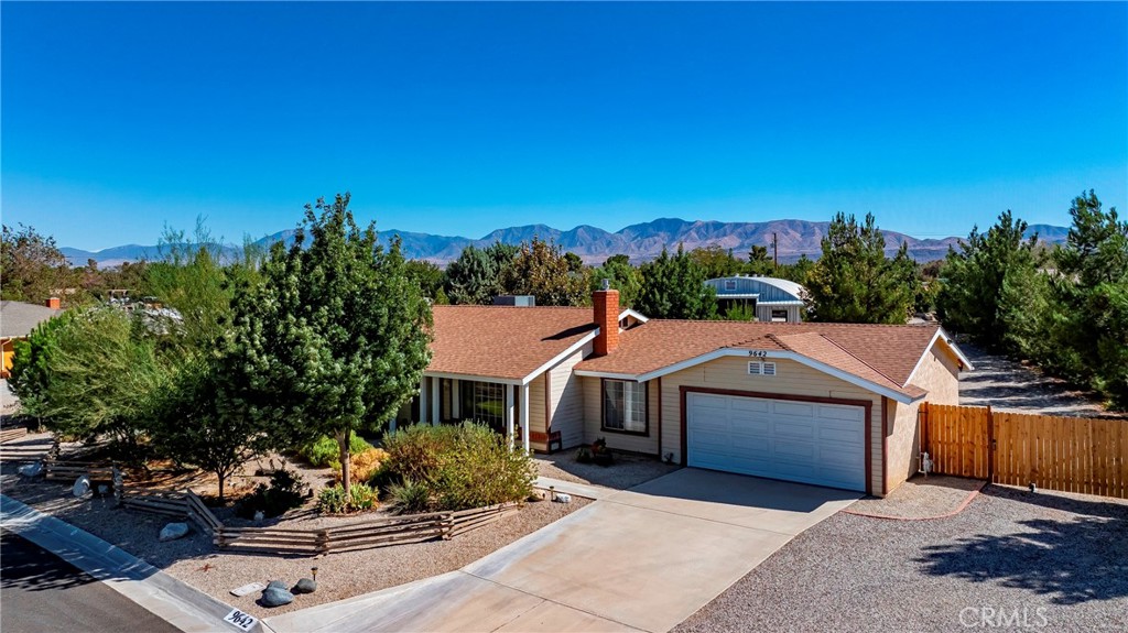 9642 East Ave R 14 Littlerock, CA 93543 - Photo 2 of 66 a aerial view of a house with a yard and sitting area