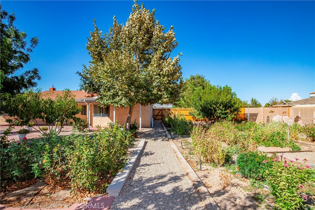 9642 East Ave R 14 Littlerock, CA 93543 - Photo 29 of 66 a view of a pathway both side of house