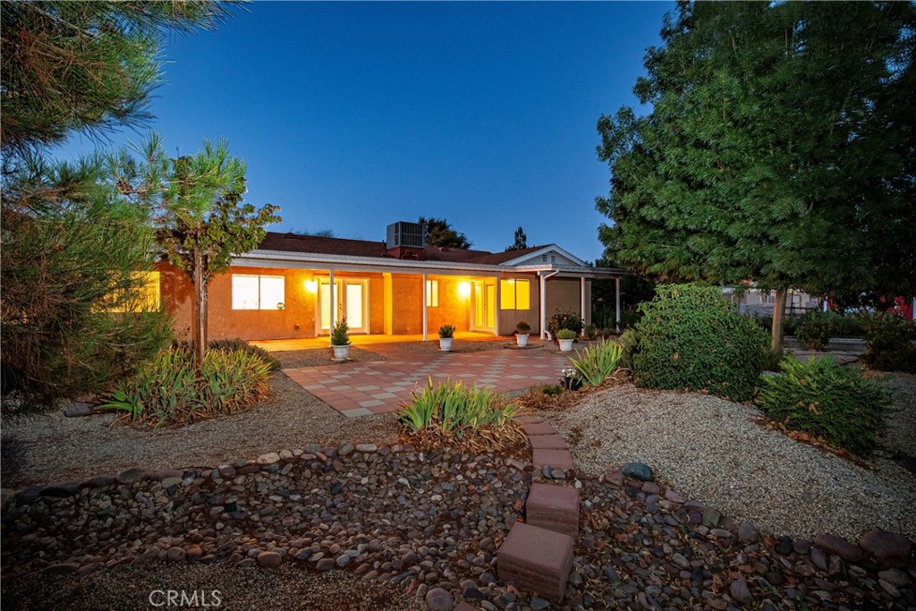 9642 East Ave R 14 Littlerock, CA 93543 - Photo 3 of 66 a view of a house with backyard and garden