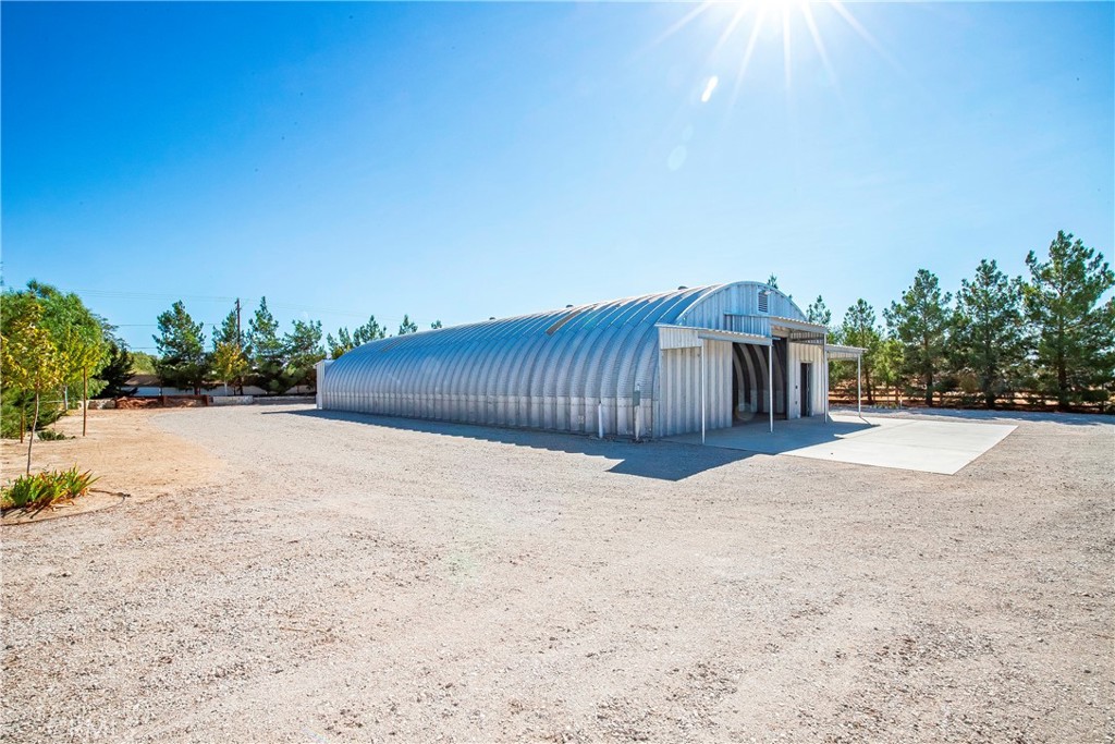 9642 East Ave R 14 Littlerock, CA 93543 - Photo 37 of 66 a view of a backyard of a house