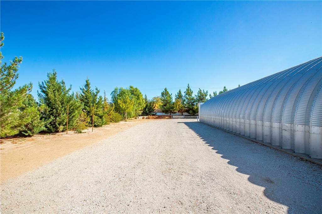 9642 East Ave R 14 Littlerock, CA 93543 - Photo 38 of 66 a view of a couches with a big yard