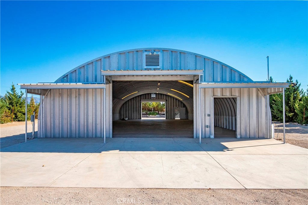 9642 East Ave R 14 Littlerock, CA 93543 - Photo 49 of 66 a view of a house with a balcony