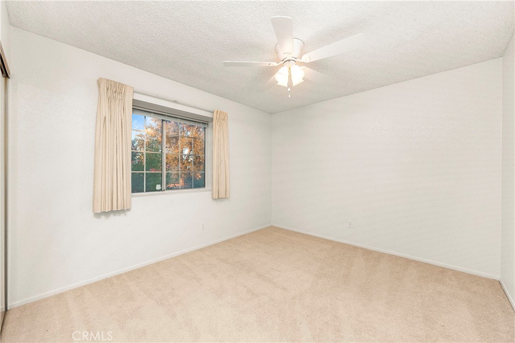 9642 East Ave R 14 Littlerock, CA 93543 - Photo 59 of 66 an empty room with a window