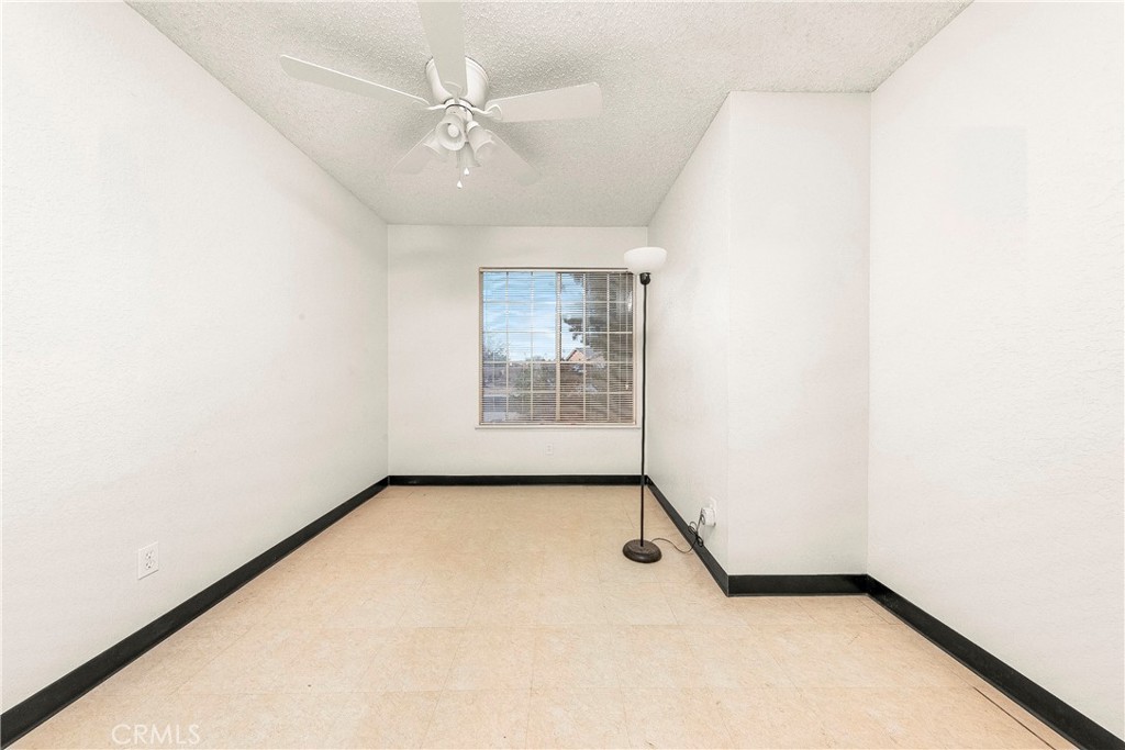 9642 East Ave R 14 Littlerock, CA 93543 - Photo 65 of 66 an empty room with windows