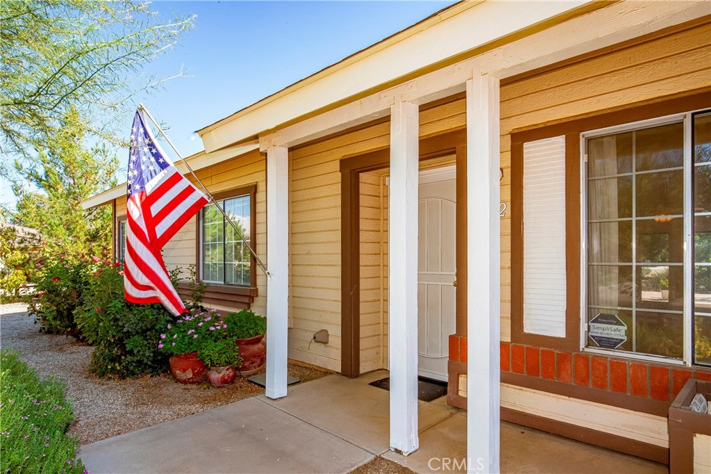9642 East Ave R 14 Littlerock, CA 93543 - Photo 9 of 66 a front door view of building and sign board