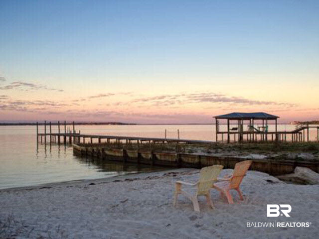 5751 Alabama Street Orange Beach, AL 36561 - Photo 8 of 25 Small Beach at the end of Alabama Street.(DOCK belongs to neighbor) Enjoy the sunrise, launch your kayak or paddle board here!