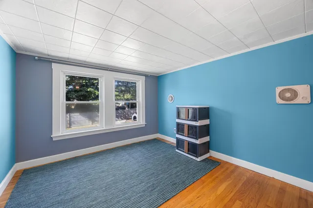 a view of a room that has a window in it