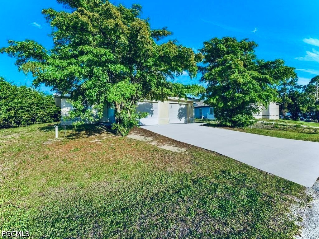 3003 Gilbert Avenue South Lehigh Acres, FL 33973 - Photo 3 of 26