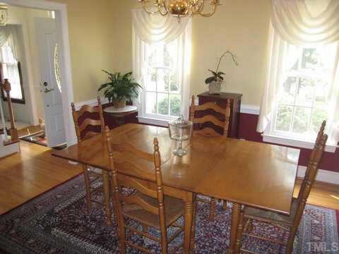 2016 Lovdal Drive Raleigh, NC 27613 - Photo 3 of 10 a view of a dining room with furniture and a window