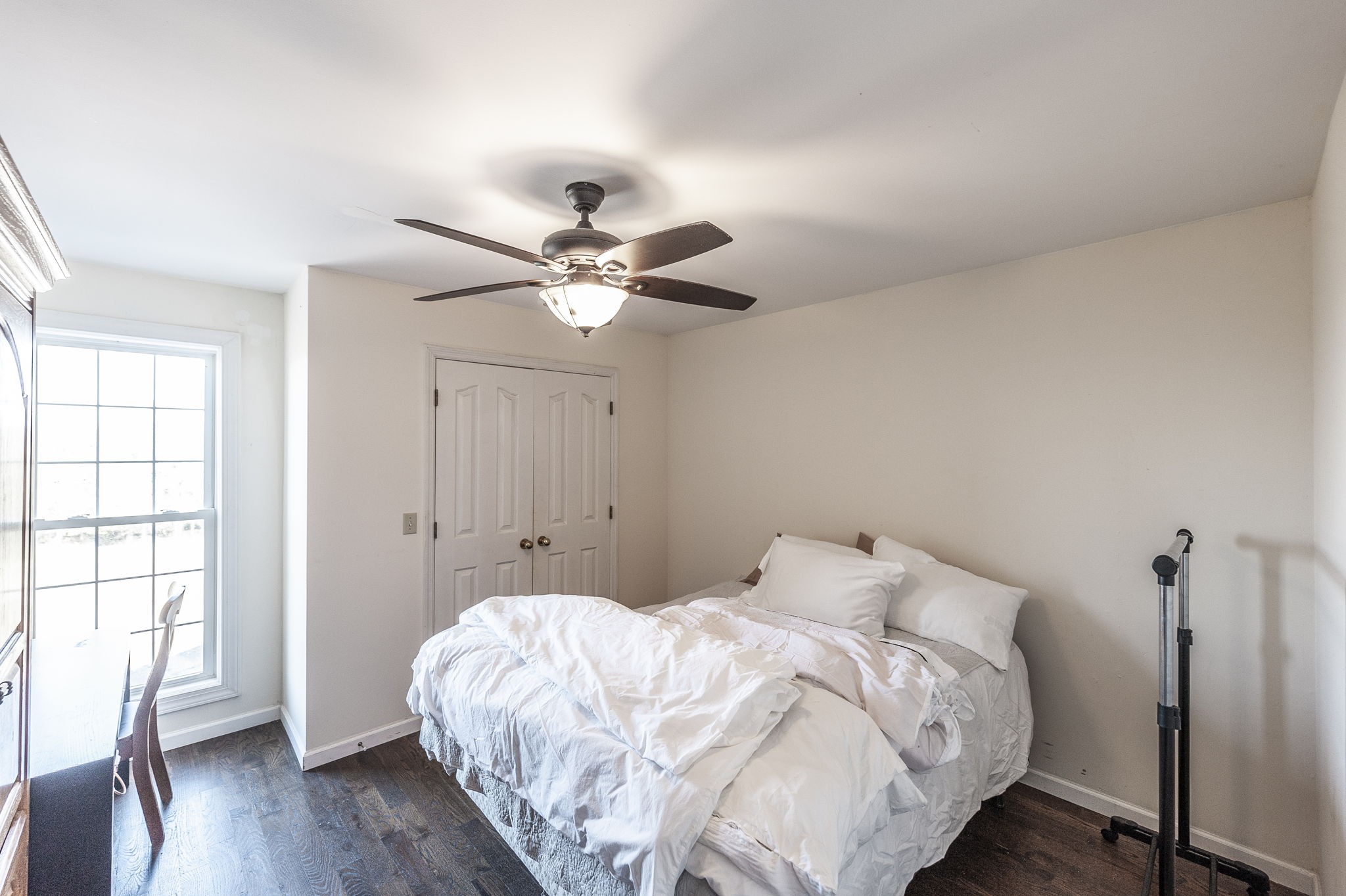 414 B Rock Springs Road Castalian Springs, TN 37031 - Photo 22 of 79 a bedroom with a bed and wooden floor