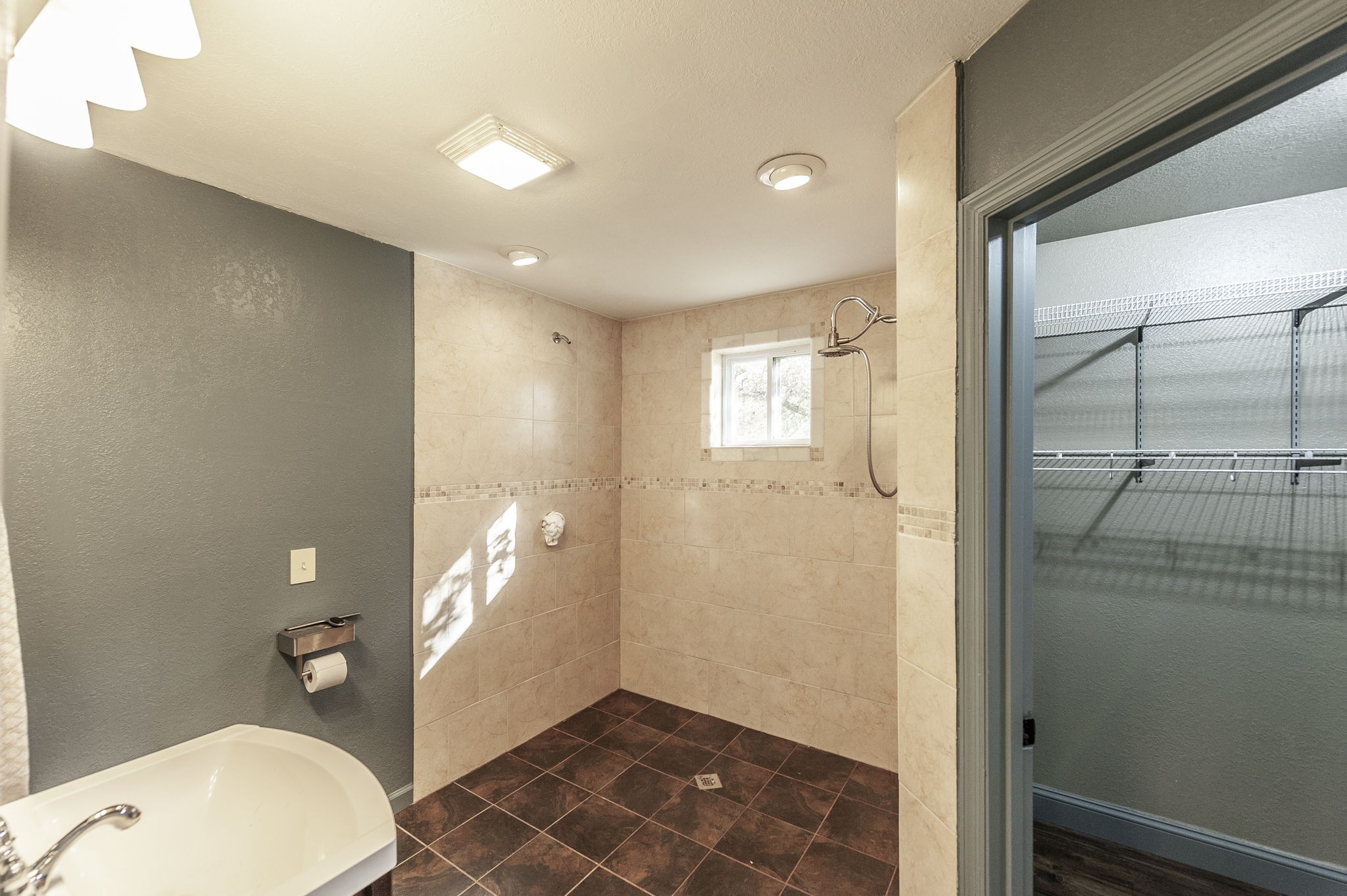 414 B Rock Springs Road Castalian Springs, TN 37031 - Photo 38 of 79 a bathroom with a toilet mirror and shower