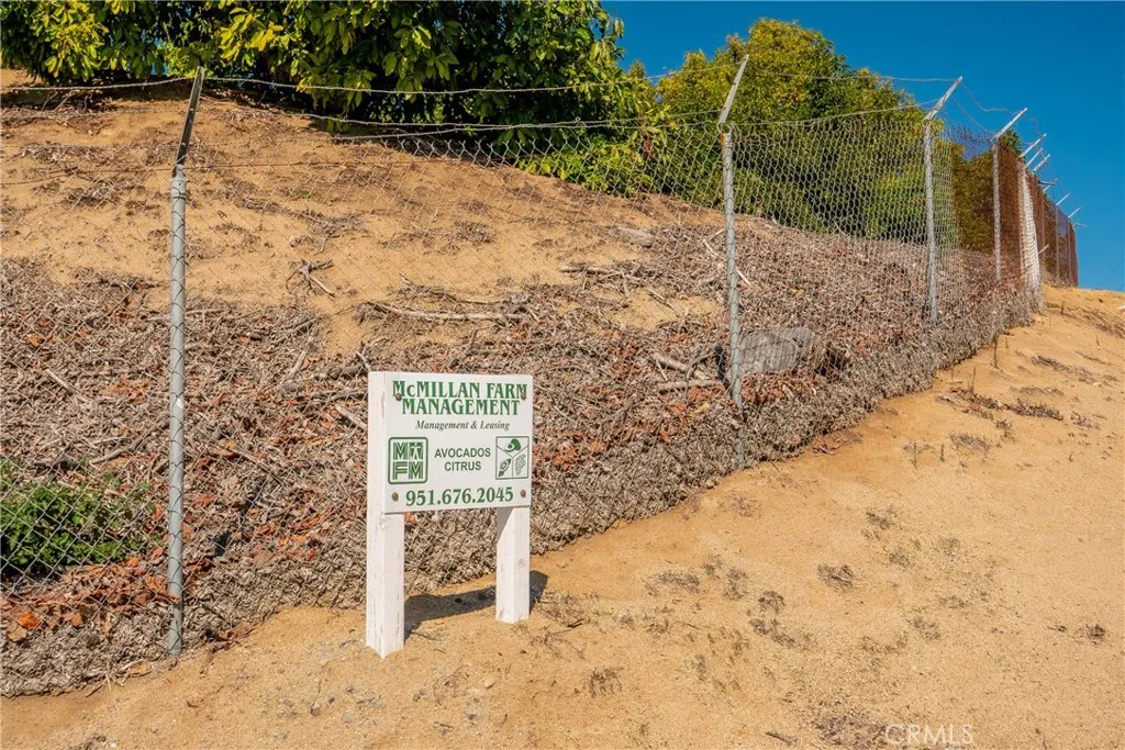 16 Camaron Road Temecula, CA 92590 - Photo 13 of 15 a view of a yard covered with snow in the background