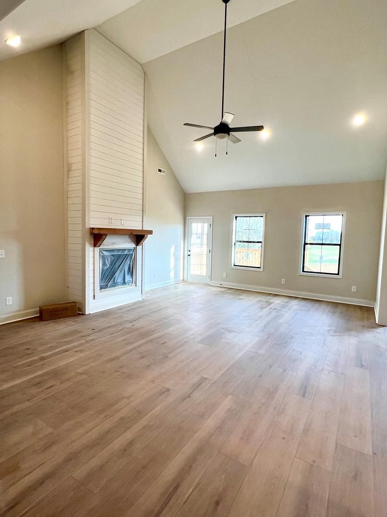 416 Old Major Road Hopkinsville, KY 42240 - Photo 12 of 29 a view of empty room with wooden floor and fan