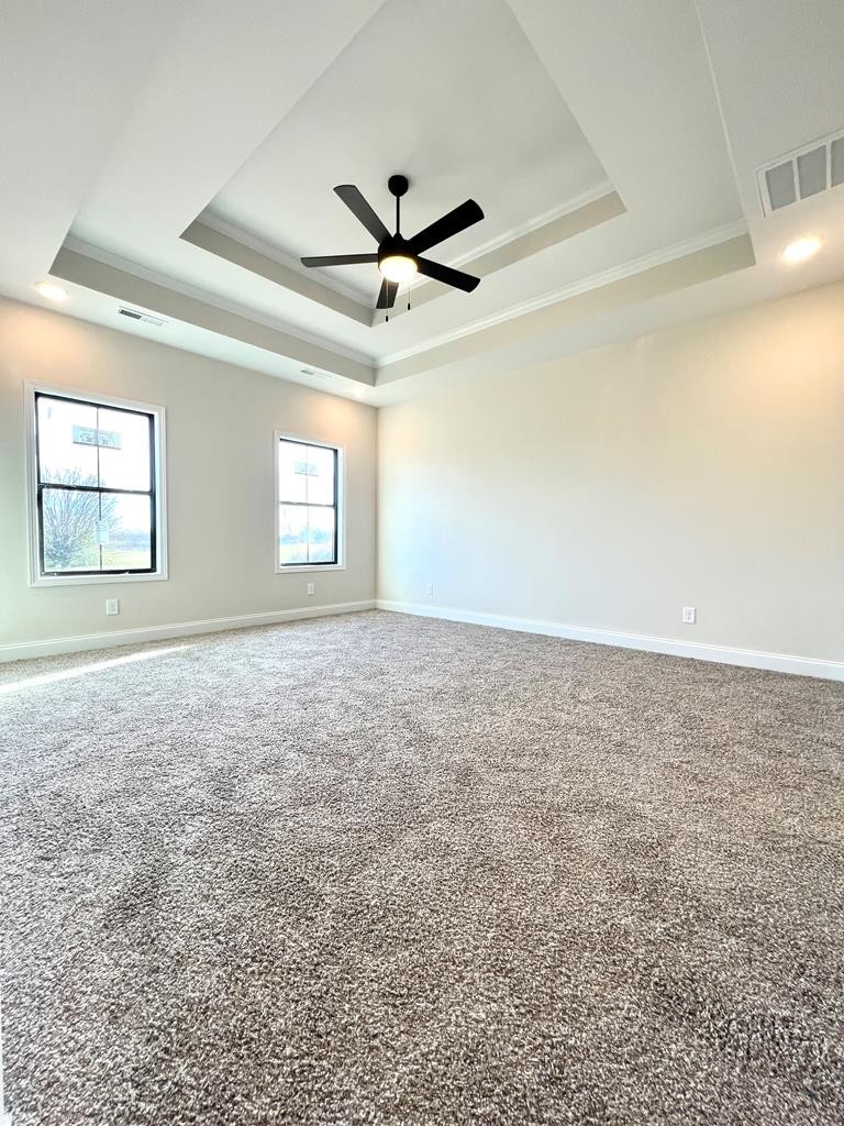 416 Old Major Road Hopkinsville, KY 42240 - Photo 14 of 29 an empty room with windows and ceiling fan