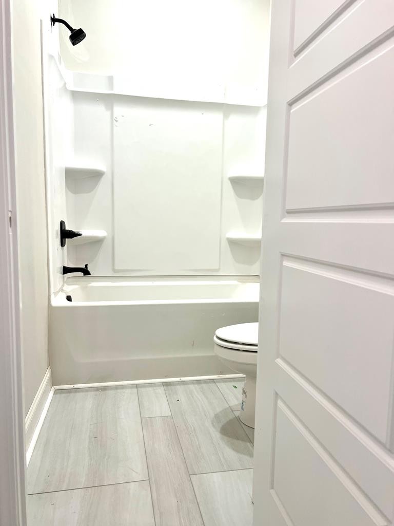 416 Old Major Road Hopkinsville, KY 42240 - Photo 24 of 29 a bathroom with a bathtub and a shower