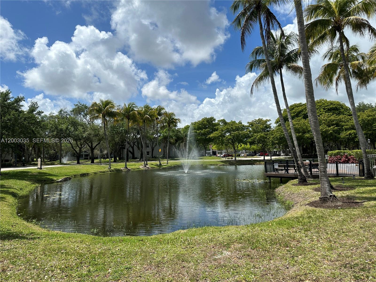 731 Lyons Road, Unit 16203 Coconut Creek, FL 33063 - Photo 11 of 14 a view of a lake view