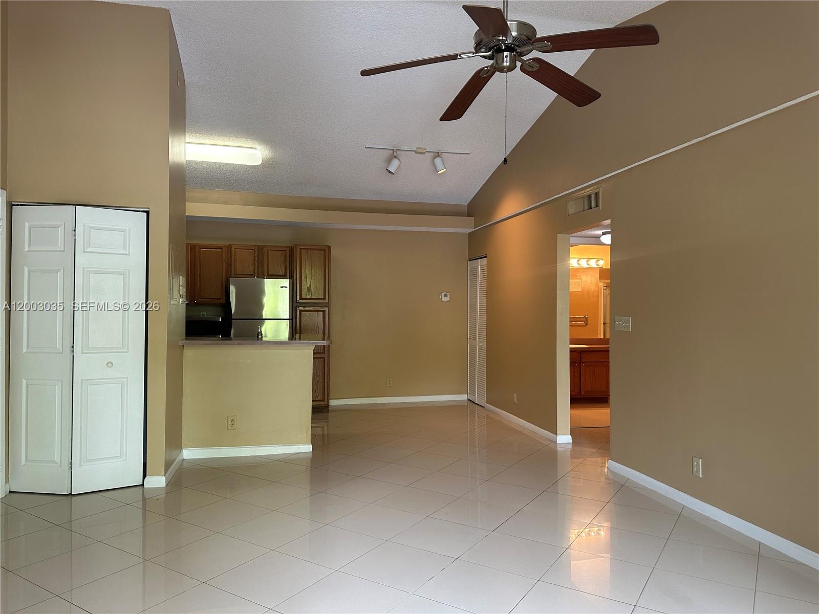 731 Lyons Road, Unit 16203 Coconut Creek, FL 33063 - Photo 6 of 14 a view of empty room