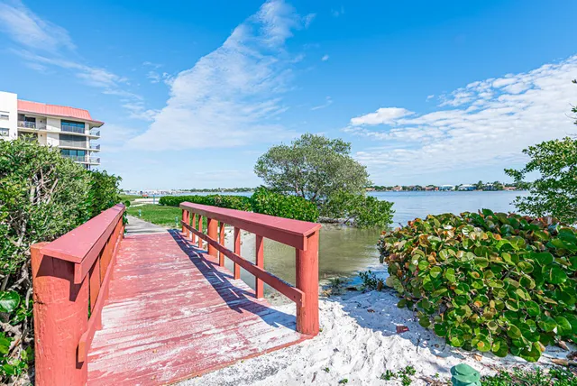 a view of a balcony with plants