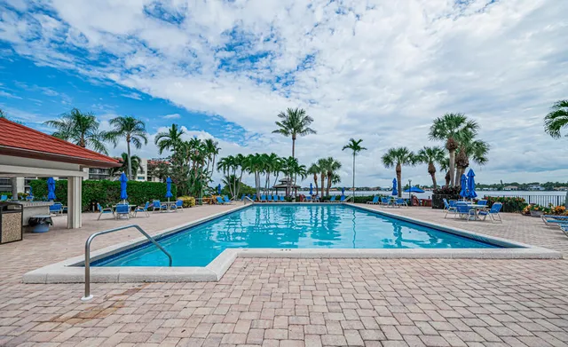 swimming pool with outdoor seating