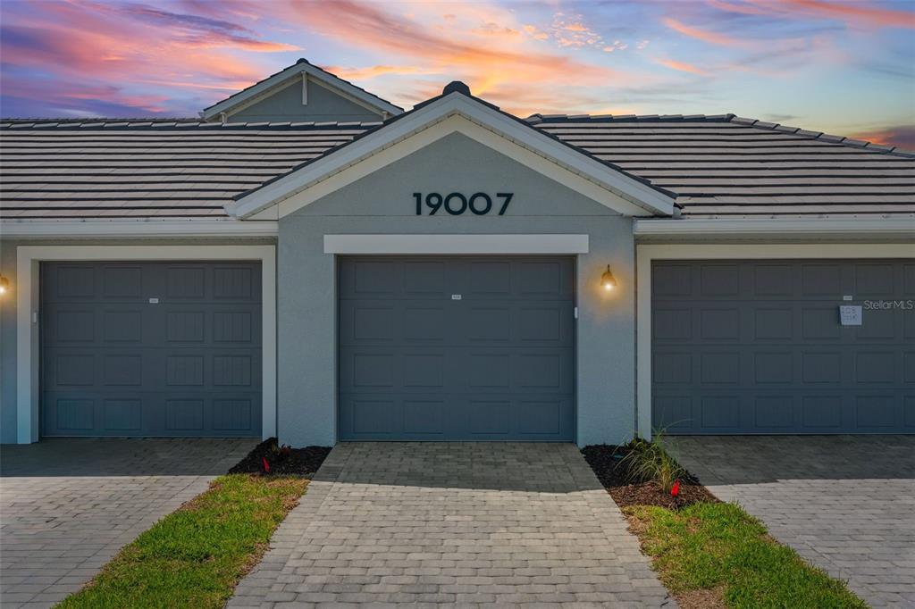 19007 Scallop Loop, Unit 108 Lakewood Ranch, FL 34211 - Photo 1 of 59 a front view of a house